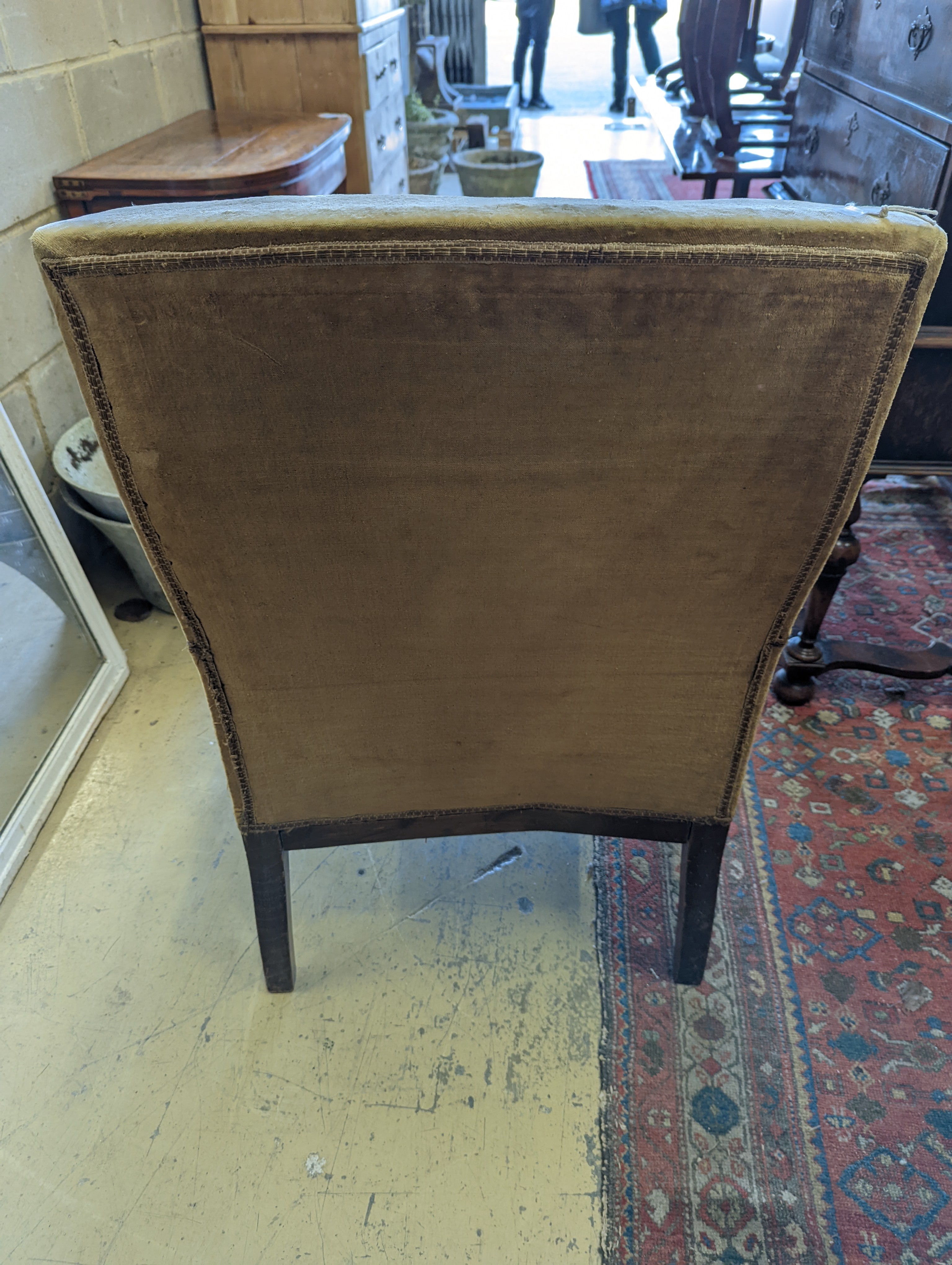 A late 19th century French carved beech armchair